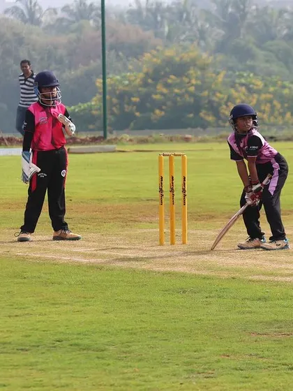 Two of our youngest players, a batter and wicketkeeper, in position during a U-10 match. We start building skills from a very early age.