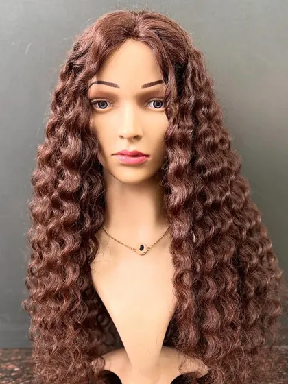 A frontal view of the dark brown curly wig, showcasing its natural texture and premium finish.