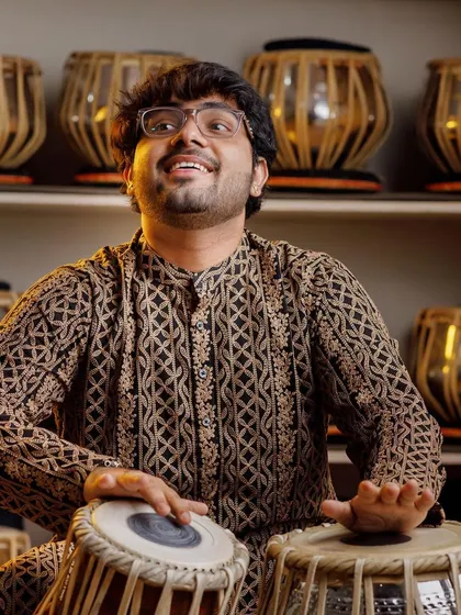 The tabla is more than an instrument, it is the music of the soul. This is a portrait of me in my element, surrounded by the drums that are my voice and my passion.
