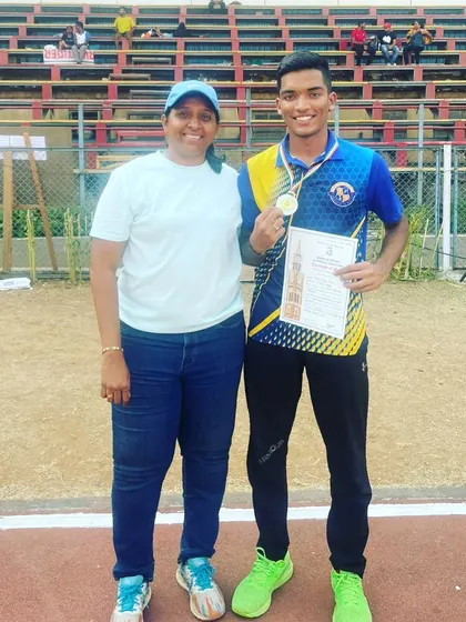 With my athlete Yash Joshi after he won a silver medal in the 400m run at the Mumbai University Inter-Zonal Athletics Meet.
