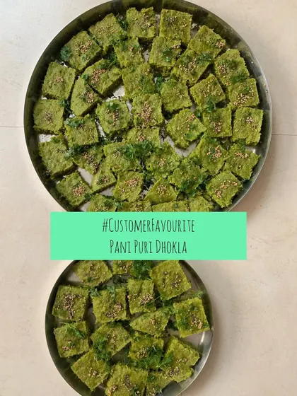 A large platter of Pani Puri Dhokla, perfect for a party.