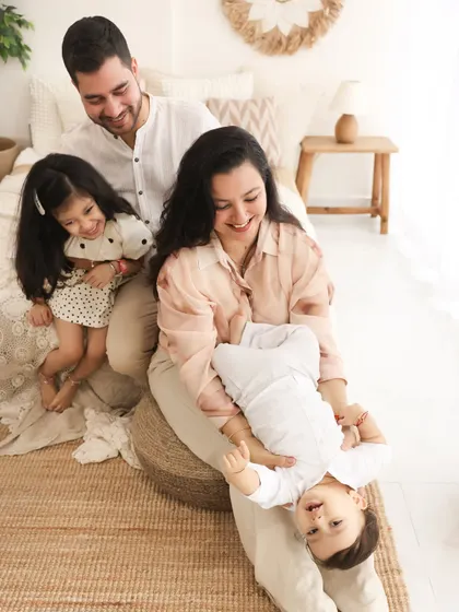 Upside-down giggles and family cuddles. This playful shot captures the chaos and love of life with little ones, all within the cozy setting of my boho studio.