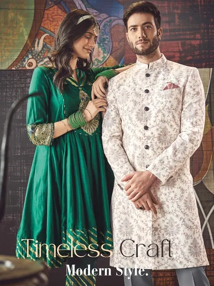 Timeless craft, modern style. This off-white floral sherwani showcases Kashmiri-inspired elegance, perfectly tailored for a sophisticated wedding celebration.