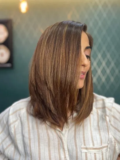 Another view of the elegant Biscoff bob, a perfect example of a modern, sophisticated haircut.