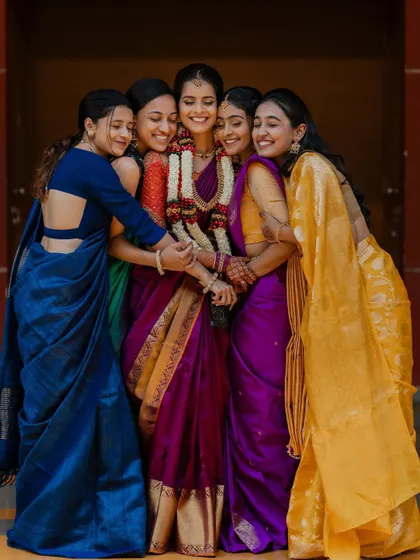 A bride surrounded by her best friends. The laughter and support from the bride tribe are some of the most beautiful candid moments to capture on a wedding day.