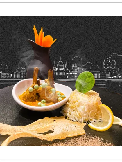 Another masterpiece from our Budapest event. This dish features tender lamb chops with rice and a crisp papad, showcasing our ability to deconstruct and reinvent Indian flavors for a global audience.
