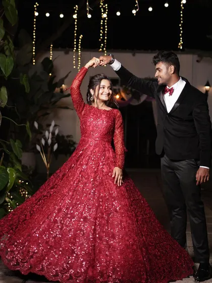 A candid moment of the couple dancing at their reception. Her makeup looks flawless even in motion, ensuring she looks her best all night.