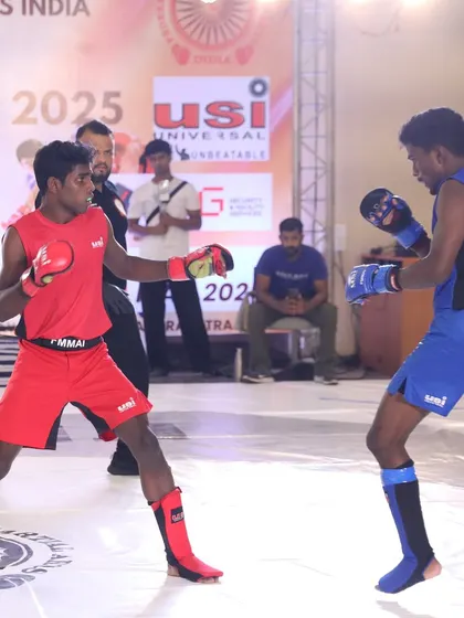 A striking exchange during a match at the FMAAI National Championship. Our fighters are comfortable and effective whether the fight is standing or on the ground.