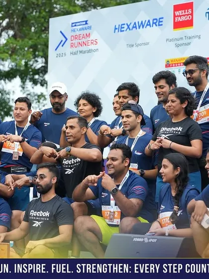 Another angle of our large running squad posing for a group photo after the Chennai half marathon. The sense of community is our greatest strength.
