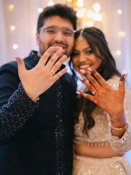 They put a ring on it! Krisha and her fiancé showing off their rings. Her makeup is subtle and beautiful.