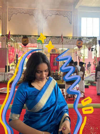 A candid moment during Navratri pooja, with blue and yellow doodles to match the festive atmosphere.
