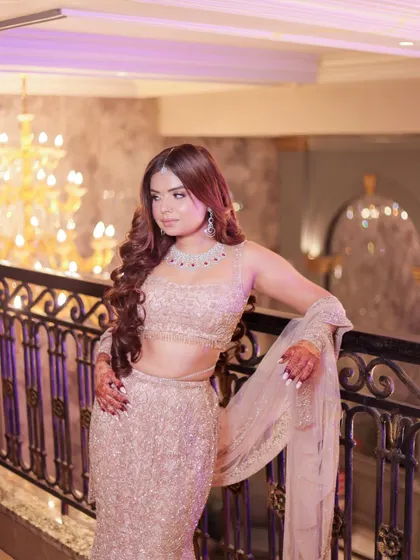 Another angle of my engagement outfit, showcasing the intricate details of the mermaid lehenga against the beautiful venue backdrop.