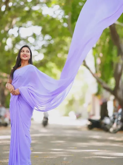 Another angle showing the impressive length and flow of the lavender trail saree's pallu.