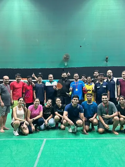 A group of our adult players posing for a photo after a day of intense competition and fun.