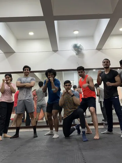 The team after another great session. The mix of serious stances and proud smiles captures the essence of our gym: hard work and a positive community.