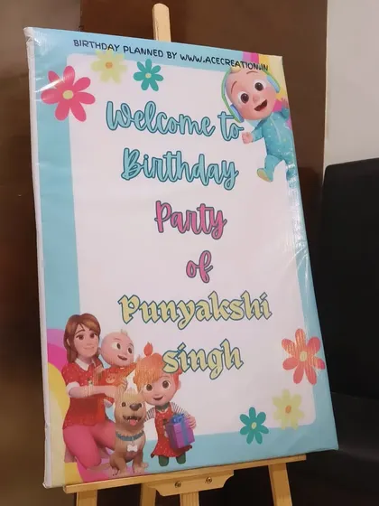 Every party starts with a warm welcome. This custom Cocomelon-themed welcome board greeted guests at Punyakshi's first birthday party.