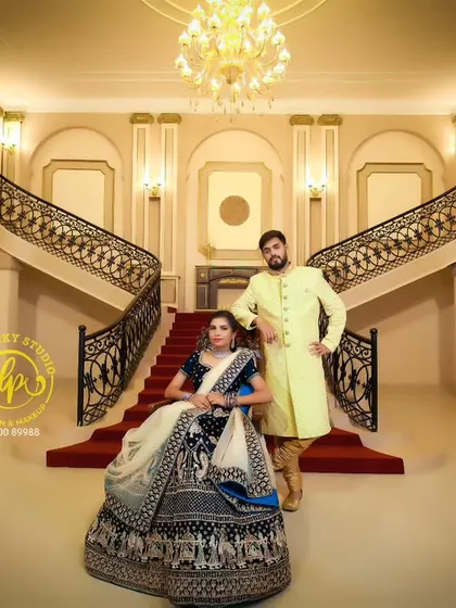 A wide shot showing the grandeur of the location and the outfits. My styling service helps create a cohesive and luxurious feel for your entire pre-wedding album.