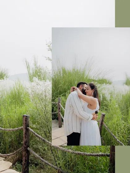 An artistic composition of a couple embracing in a field of white kans grass, creating a soft and dreamy atmosphere.