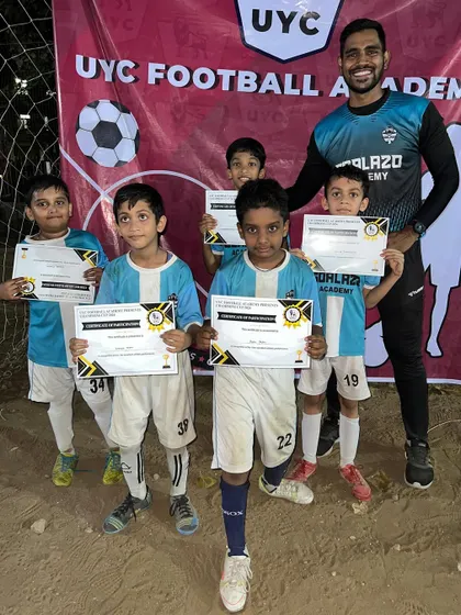 Our youngest U-7 players with their participation certificates from the UYC Championship.