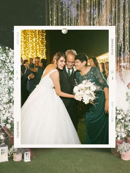 A heartfelt moment between the bride and her parents. The film-strip frame adds a nostalgic touch to this emotional and beautiful family portrait.
