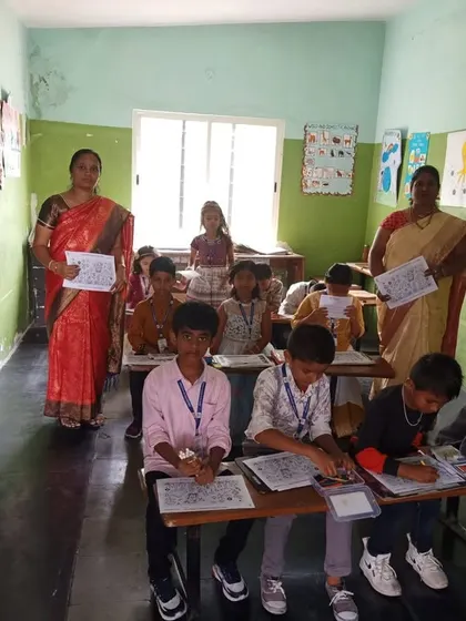 A classroom full of young artists at Amara Vidya Niketan, all focused on their creations. Our events are organized to provide a structured yet fun environment for children to explore their creativity.