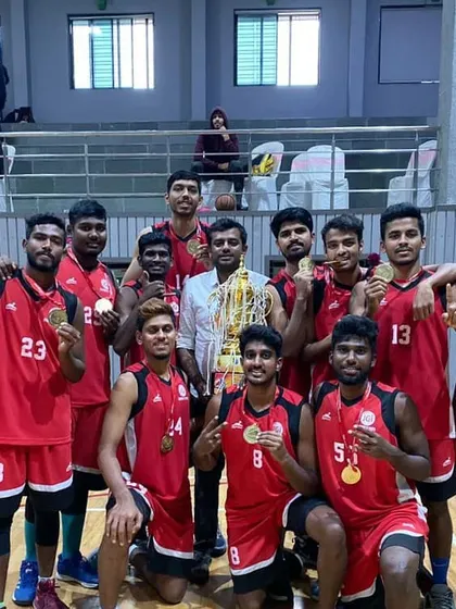 Celebrating with the Jain University team after becoming All India Inter-University Champions. This is the pinnacle of collegiate basketball.