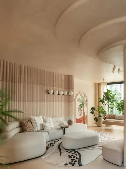 The color palette for this home was inspired by a triple chocolate mousse. We used layers of rich mocha, caramel, and ivory tones on the walls and microcement flooring to wrap the home in a comforting, tactile calm.