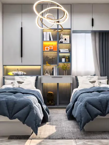 A compact shared bedroom for two, with a central storage unit that doubles as a divider and desk. The modern lighting and clean lines make the small space feel organized and stylish.