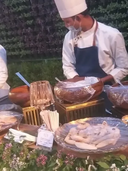 Our team at a live chaat counter, preparing various Indian street food delicacies. These stations are always a crowd-pleaser, offering a taste of authentic, flavorful snacks.