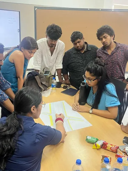**People of Compartment S4: Nishita Parmar:** Nishita leading a team discussion, demonstrating her collaborative and data-driven approach to urban design. Her work is shaping Bengaluru's urban landscape.
