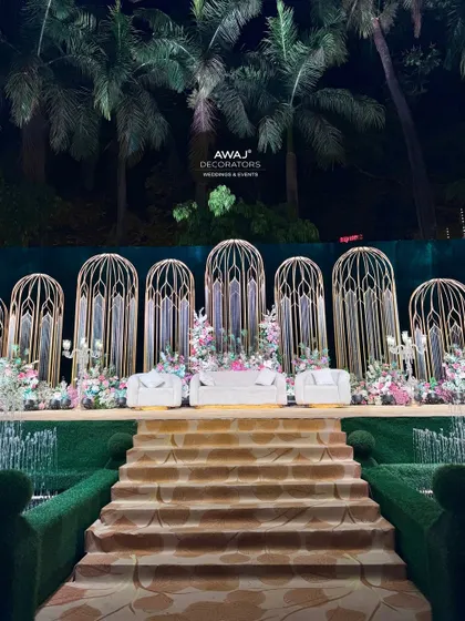 The stage viewed from the top of the stairs, a perspective that highlights the grandeur of the entrance and the intricate design of the backdrop.
