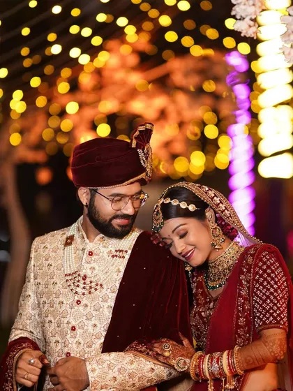 A tender moment between the bride and groom. Our makeup is designed to look beautiful from every angle and in every light, ensuring your wedding photos are perfect.