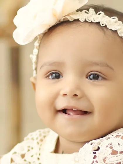 An even closer portrait capturing a precious, gentle smile. These close up shots are perfect for remembering those tiny, fleeting features.