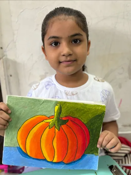 This vibrant pumpkin drawing demonstrates how we learn about shading and light to make objects look three-dimensional. It's a great example of the skills we build, from basic to advanced.
