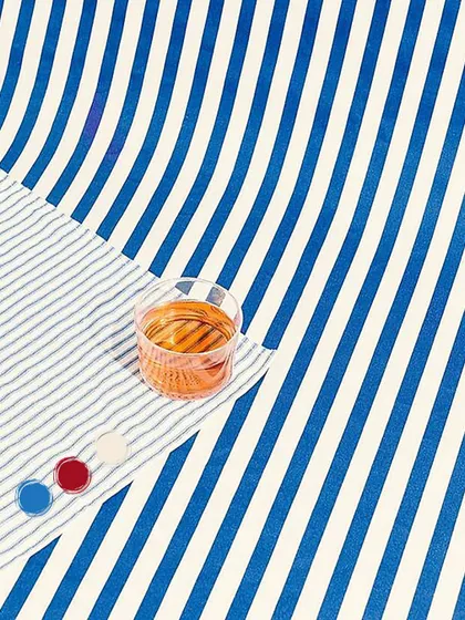 A canvas of indigo dreams. This flat-lay image captures the artistic details of the Transcendence Kimono Wrap set, with its rich blue stripes and bold red accents.