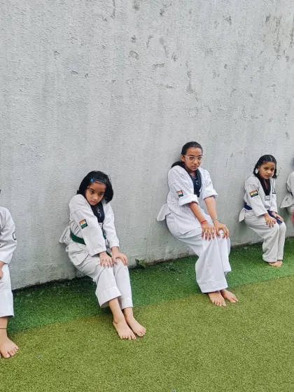 More wall sits. This exercise is a staple in our conditioning routine because it builds the strong legs needed for powerful Taekwondo stances and kicks.