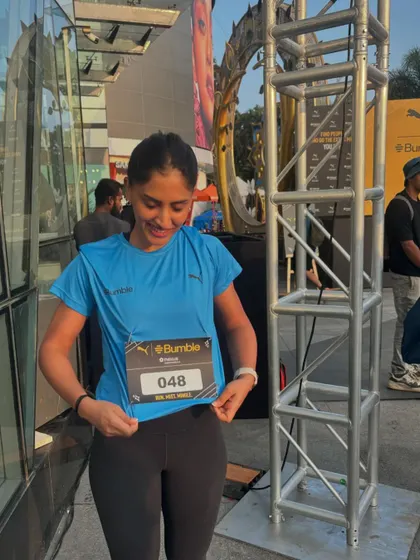 Showing off my race bib at the Puma x Bumble run. I was low-key dying after the run, but it was a fantastic Sunday morning.