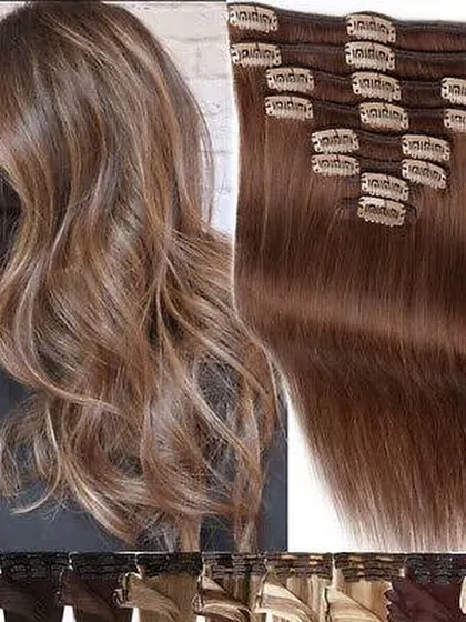 A beautiful example of a full head of clip-in extensions, perfectly blended to create a voluminous, highlighted look. We offer a wide range of colors to match any style.