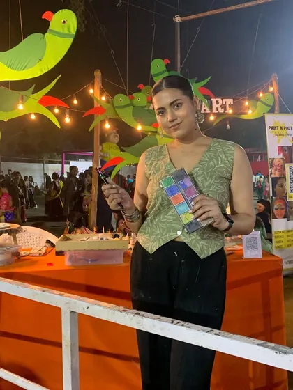 Posing at our stall at the United Way Garba, one of the biggest events we do. We love the energy of Navratri.