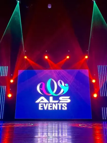 For the GS Dance Academy's annual show, I created this custom stage featuring their initials as large, illuminated letters flanking the central LED screen, providing a unique branding opportunity.