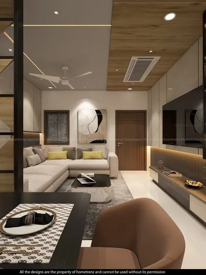 A view from the dining table into the living room. The open layout is perfect for entertaining, allowing for easy conversation between the two spaces.
