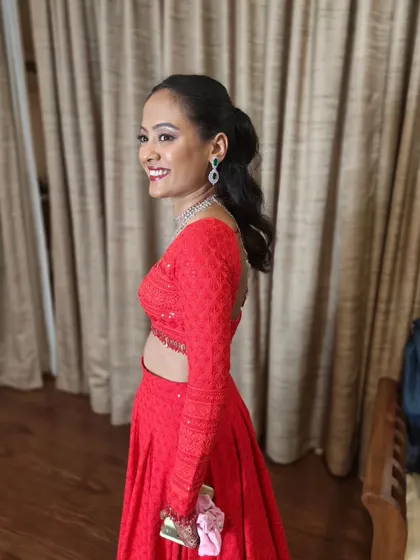 Another angle of the sangeet look. The high ponytail is a great choice for dancing and keeps the hair off the neck.