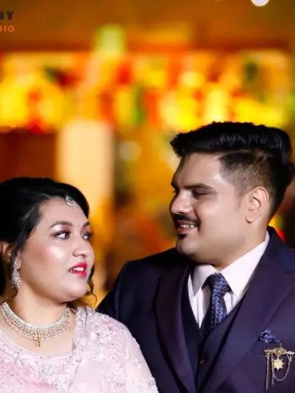 A candid shot of the couple sharing a look during their reception. These unposed moments often become the most treasured photographs from the event.