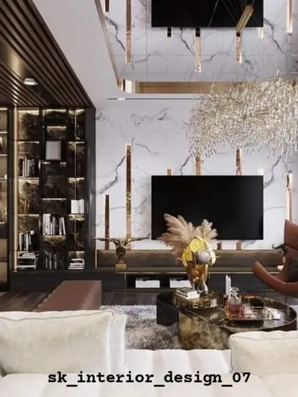 A luxurious living room with a double-height ceiling and a dramatic TV wall. The design incorporates a fireplace, extensive shelving, and a stunning chandelier for a truly opulent feel.