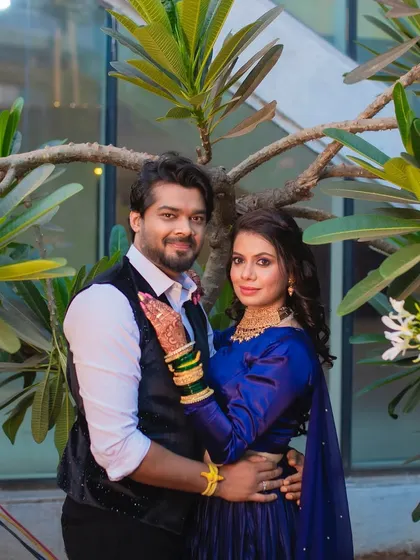 A confident and happy couple. The bride's makeup is bold and beautiful, a perfect match for her vibrant personality.