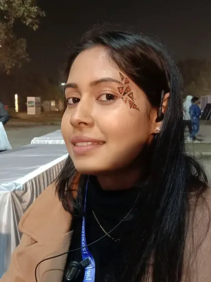 A pattern of glittery triangles along the hairline. This is a great example of how geometric shapes can be used to create a chic, modern look.