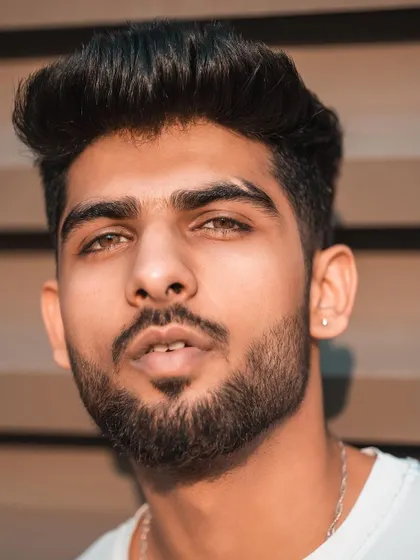 Another strong headshot variation, this image has a slightly different expression and angle. Providing these subtle variations is part of our comprehensive portfolio service.