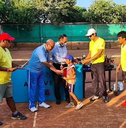 A young winner from our U-12 category receiving his prize. Our tournaments provide a real chance for kids to compete, make friends, and see their progress.