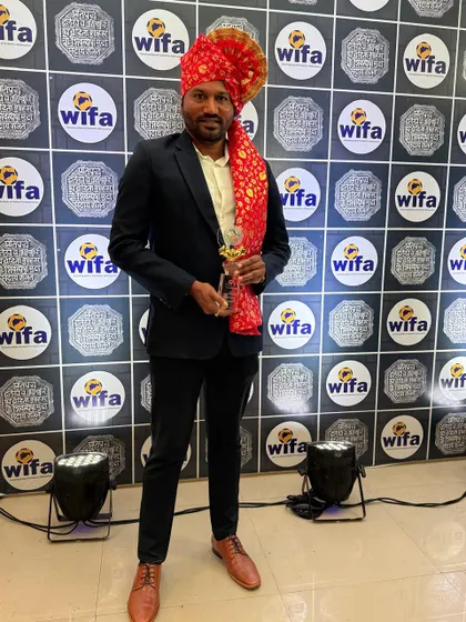 Coach Paresh Shivalkar at the WIFA awards ceremony. His achievements inspire our entire academy and validate the high quality of mentorship our players receive.
