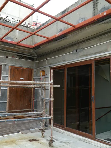 A sneak peek of a terrace project under construction in Pitampura, Delhi. This image shows the initial framework for the pergola and other structures before the final transformation.
